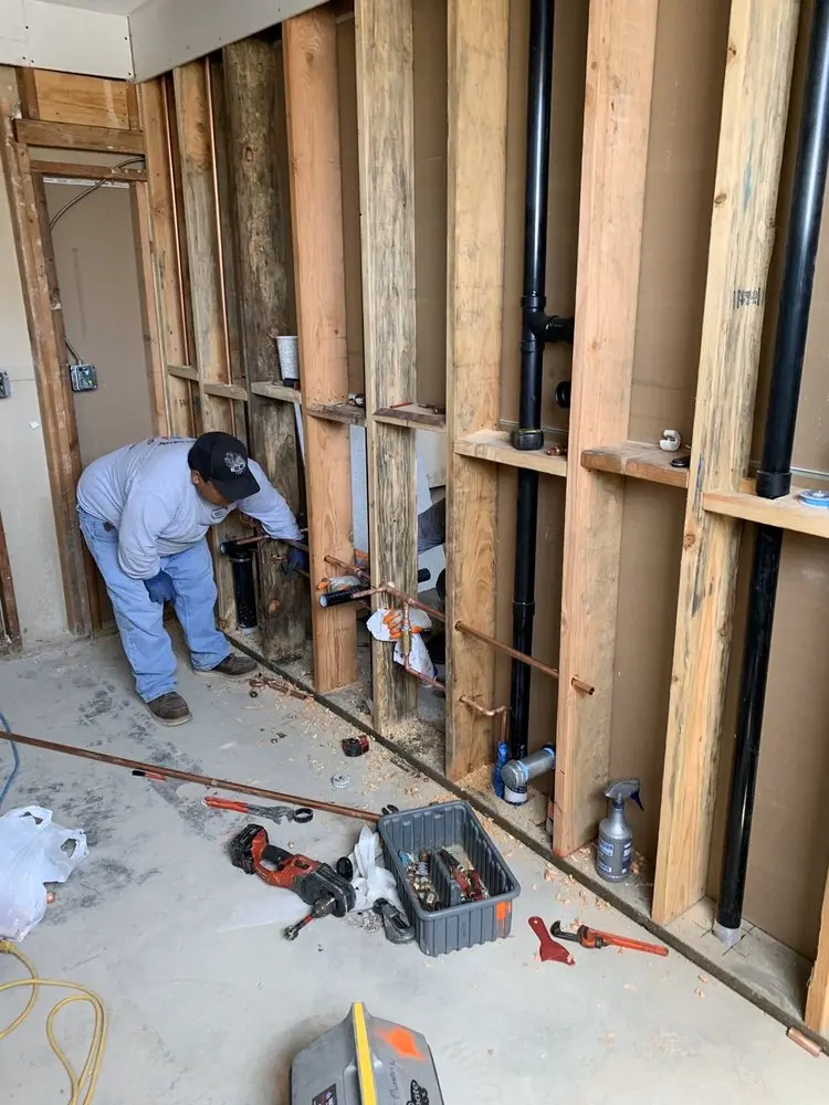 Commercial rough-in plumbing for Water Heater Replacement in Ellington